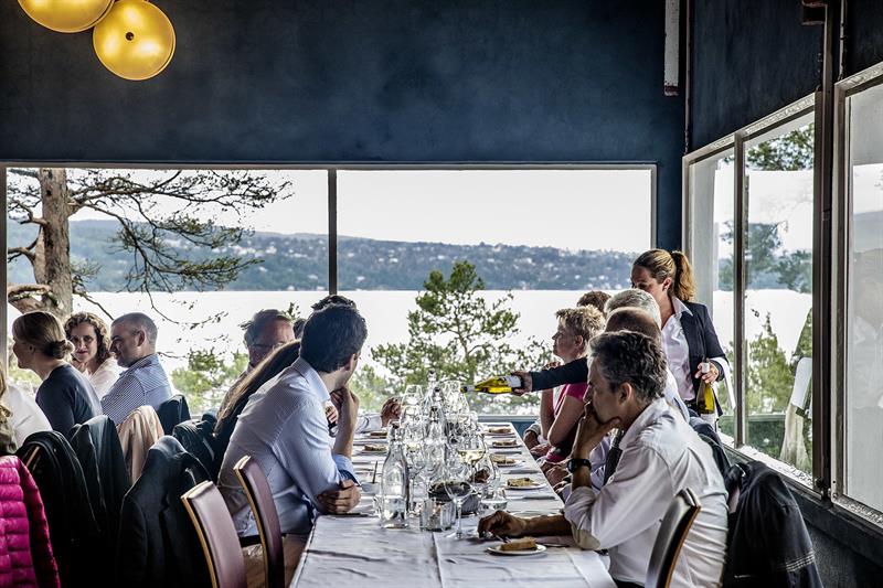 Indoor dining with a nice view of the fjord.